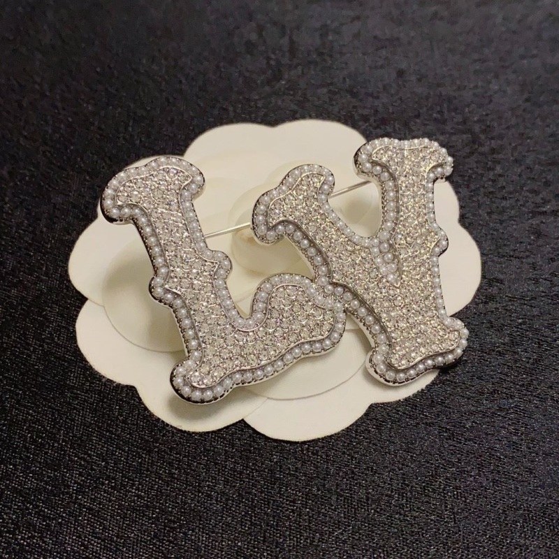 LV Brooches